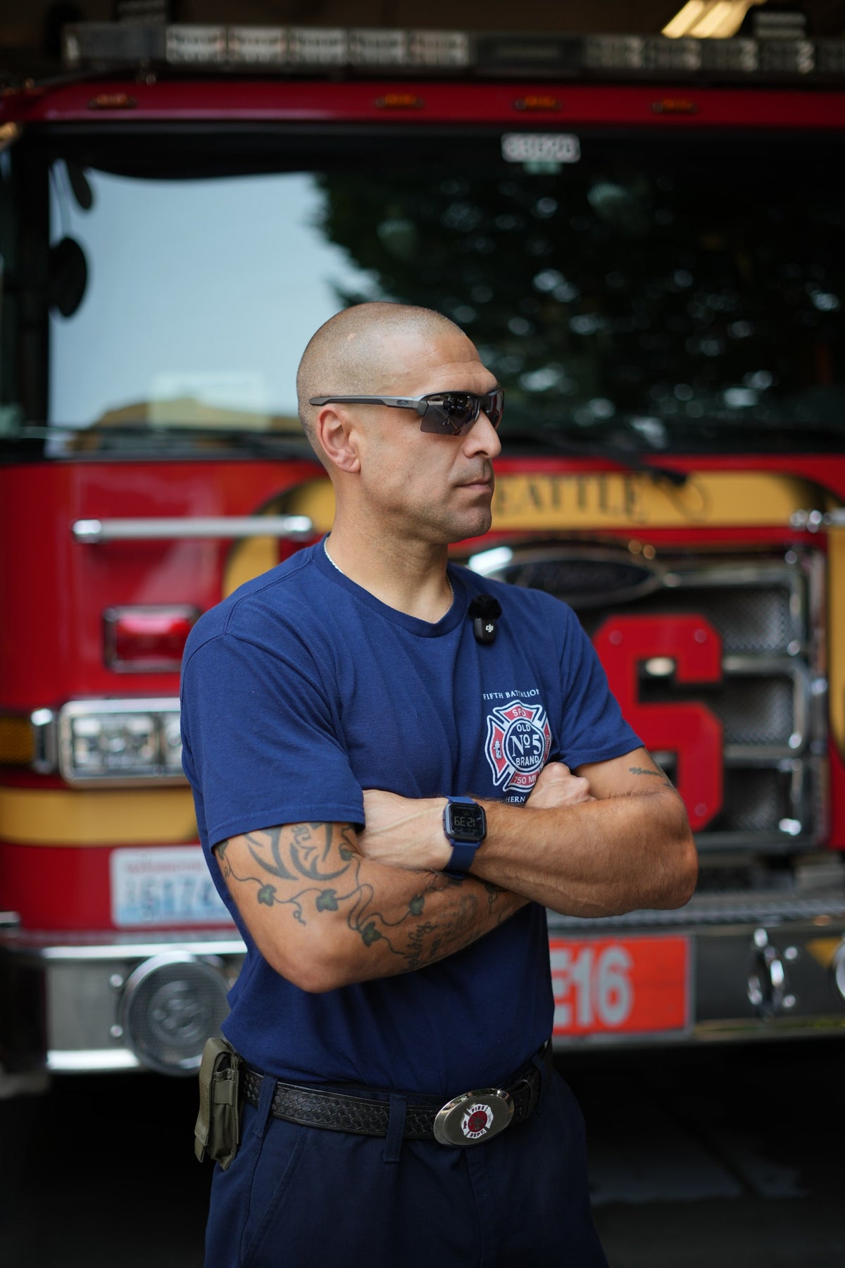 Firefighter wearing Torque Fulcrum sunglasses at the station