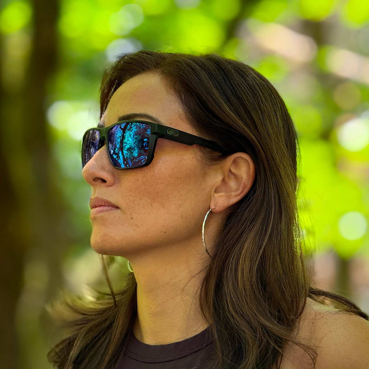 Woman wearing Satin Black Fulcrum sunglasses outdoors